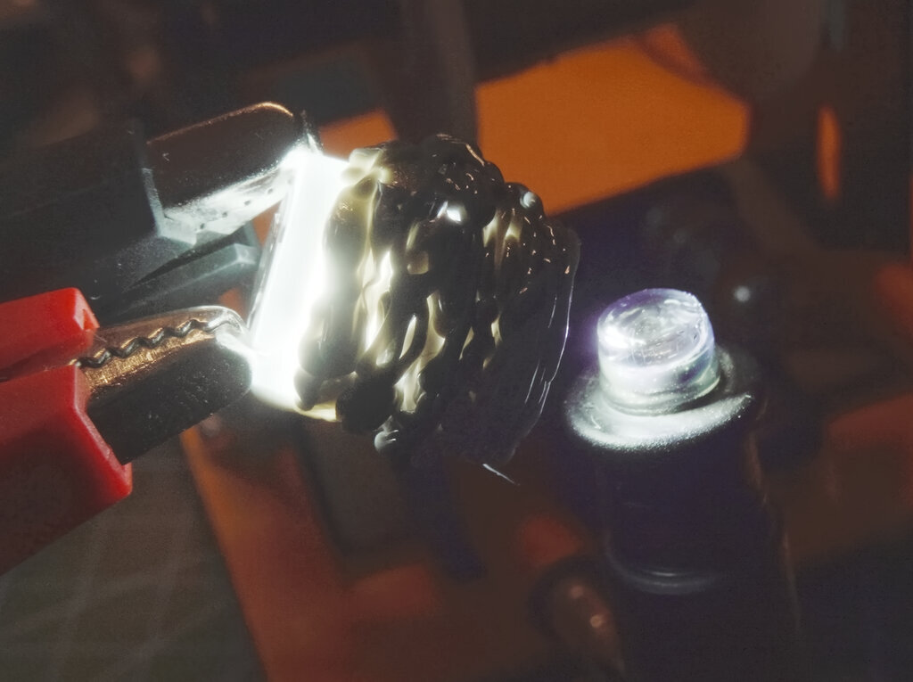 Stacked LED lenses with coupling lens assembly. Note the 3D printing filament blobs for positioning